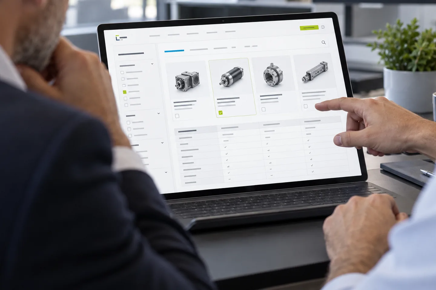Due professionisti valutano un catalogo B2B dimostrativo con filtri e specifiche tecniche.